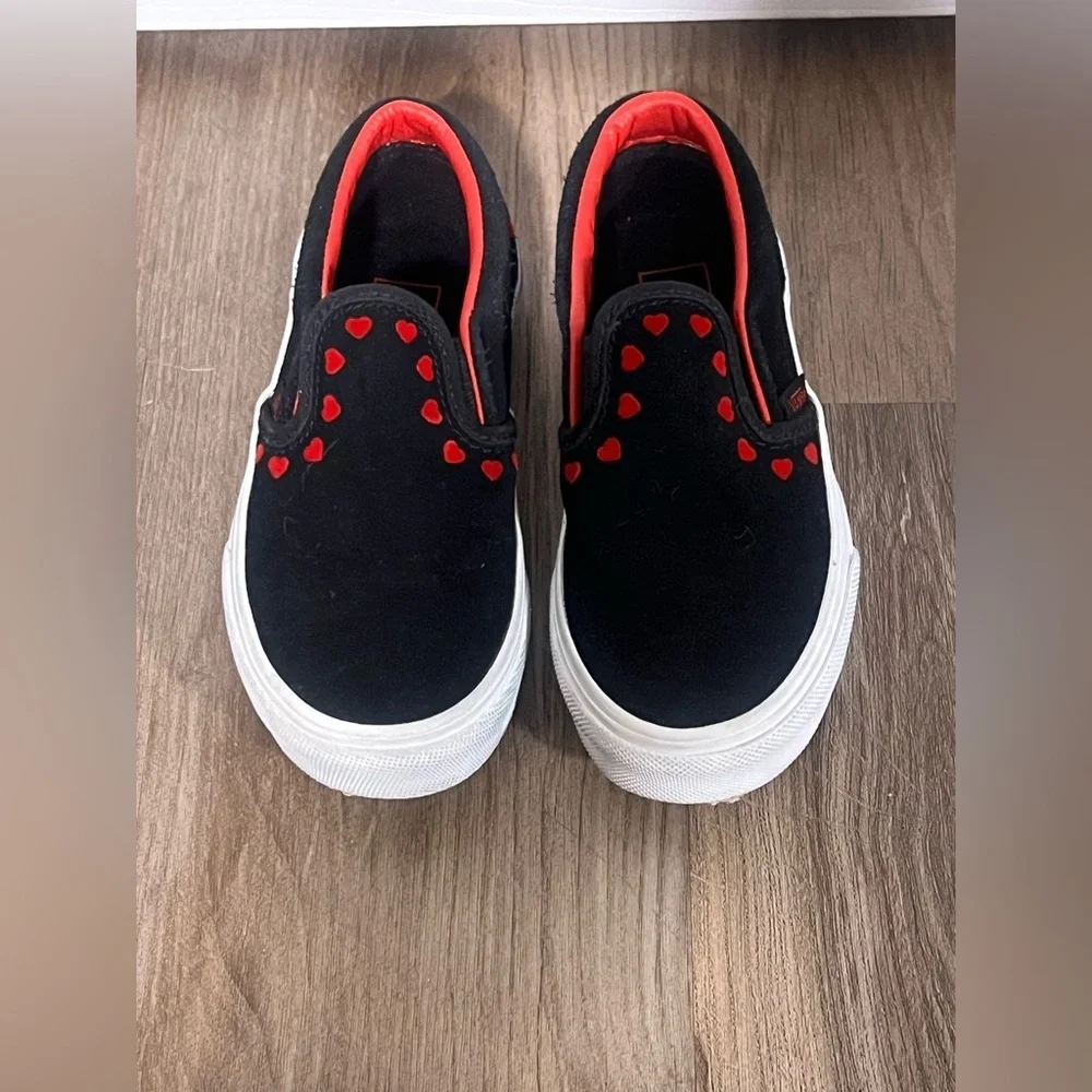 Vans Slip-On Sneakers with Red Heart Accents
